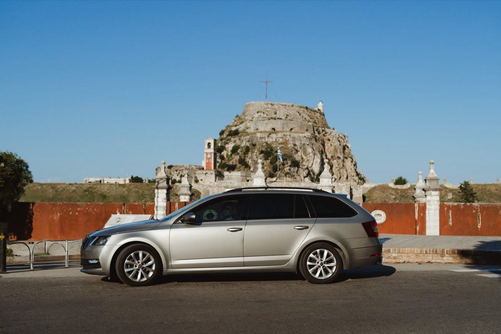 The My Corfu Transfer Škoda Octavia beside Corfu’s Old Fortress